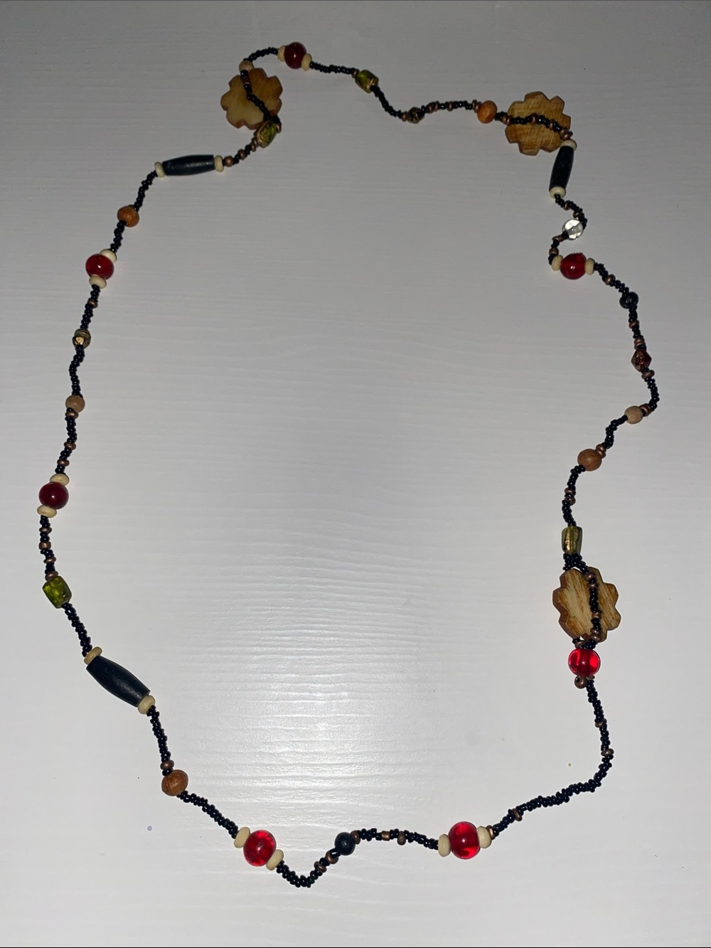 Handcrafted Black Bead Necklace with Red and Wood Accents